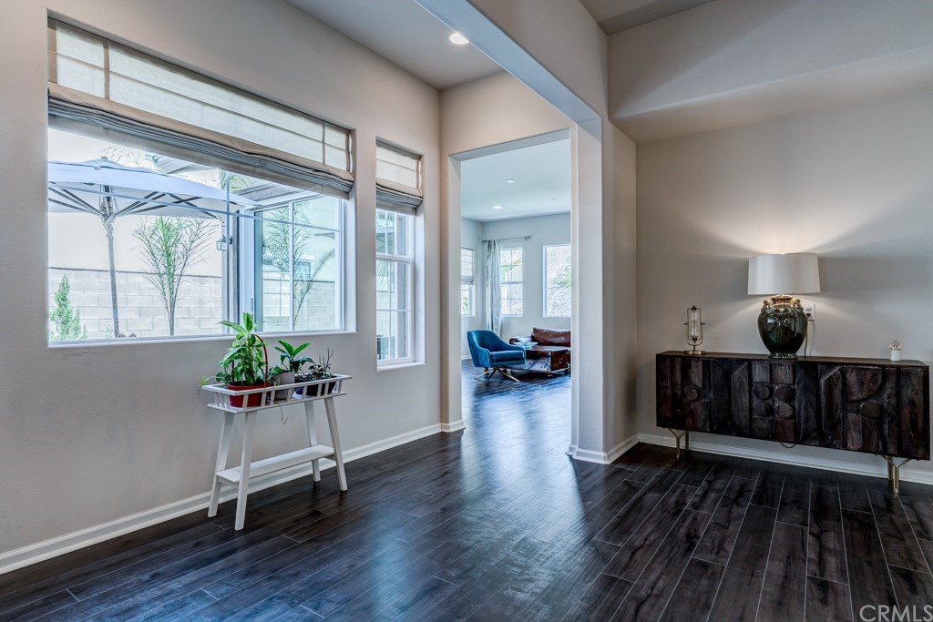 12370 Alamo Drive Rancho Cucamonga, CA 91739 - Photo 10 of 47 a living room with furniture and wooden floor