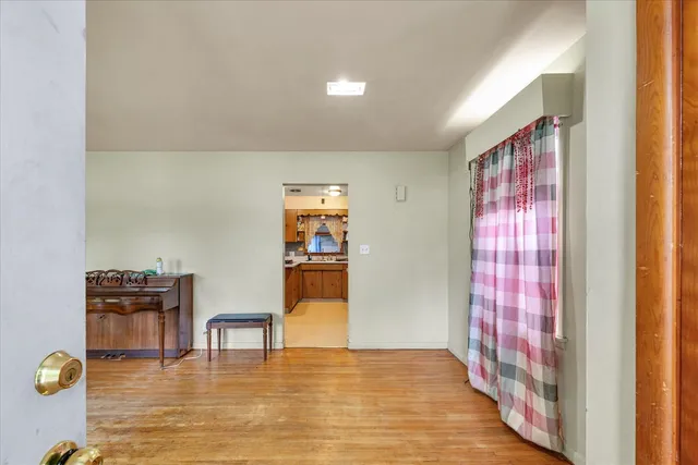 a view of kitchen and dining room with furniture