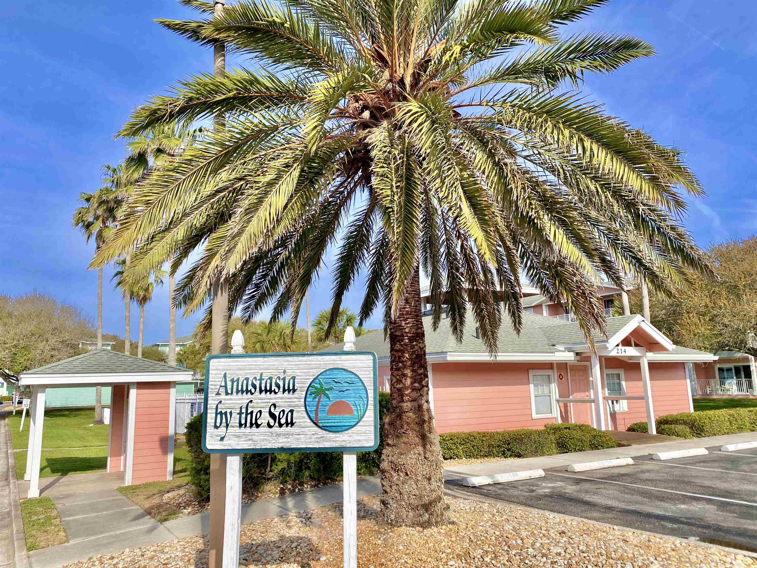 204 16th Street, Unit G St. Augustine Beach, FL 32080 - Photo 1 of 31 a sign that is on a street