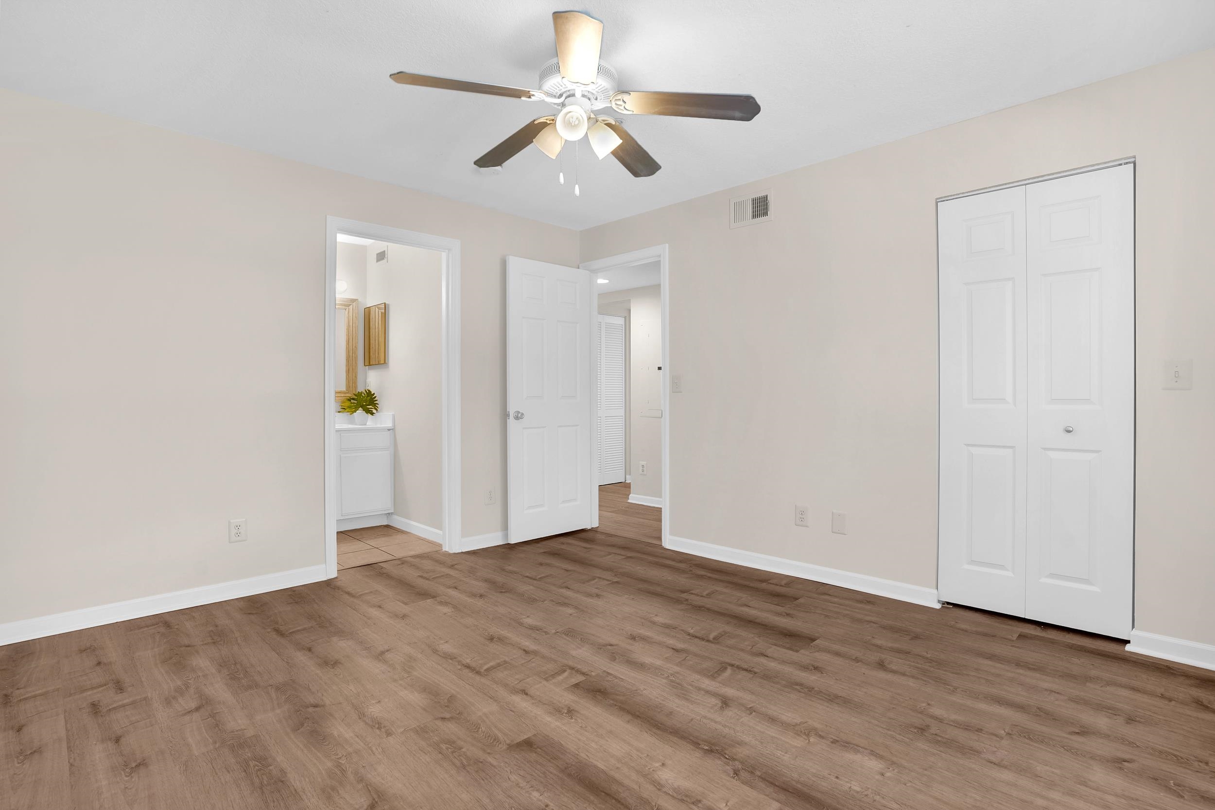 204 16th Street, Unit G St. Augustine Beach, FL 32080 - Photo 13 of 31 wooden floor in an empty room