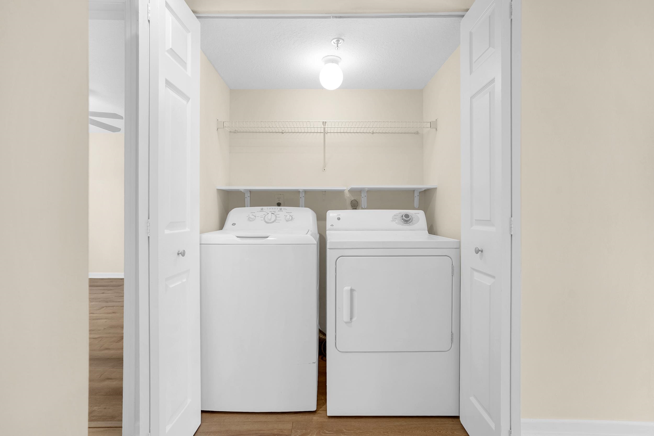 204 16th Street, Unit G St. Augustine Beach, FL 32080 - Photo 22 of 31 a utility room with dryer and washer