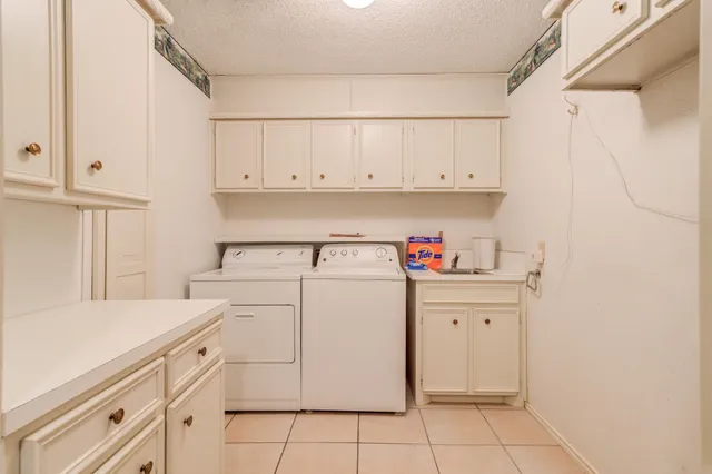 a view of room with yard and ceiling fan