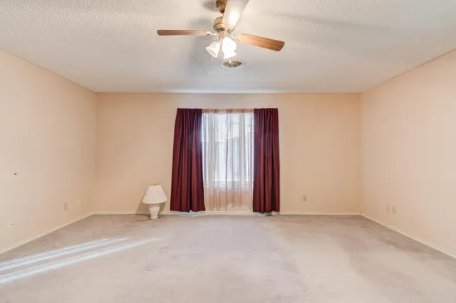 a close view of dresser and mirror