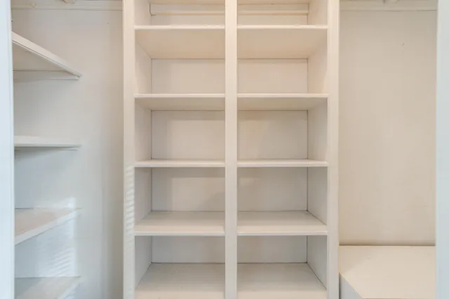 a view of a house with a snow on the road