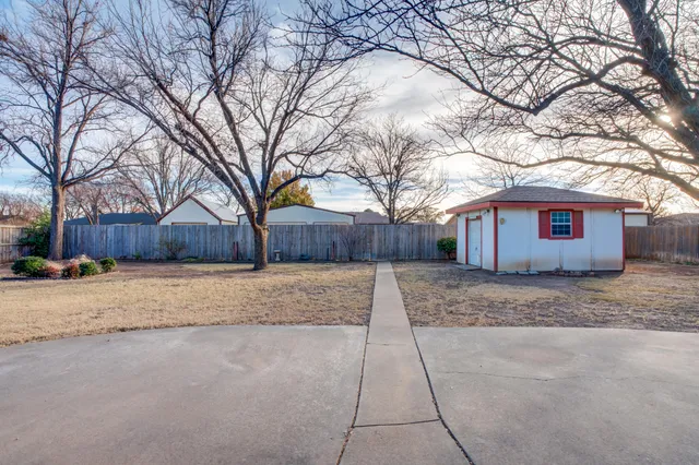 a house with trees in front of it