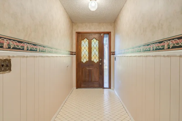 a kitchen with stainless steel appliances granite countertop a stove and a sink