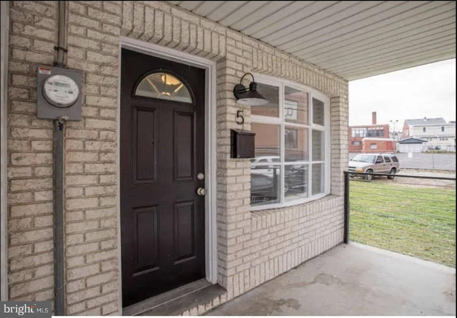 a view of a entryway door front of house