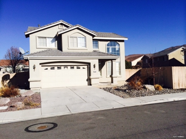 10096 Zephyr Heights Drive Reno, NV 89521 - Photo 1 of 1 a front view of a house with entertaining space