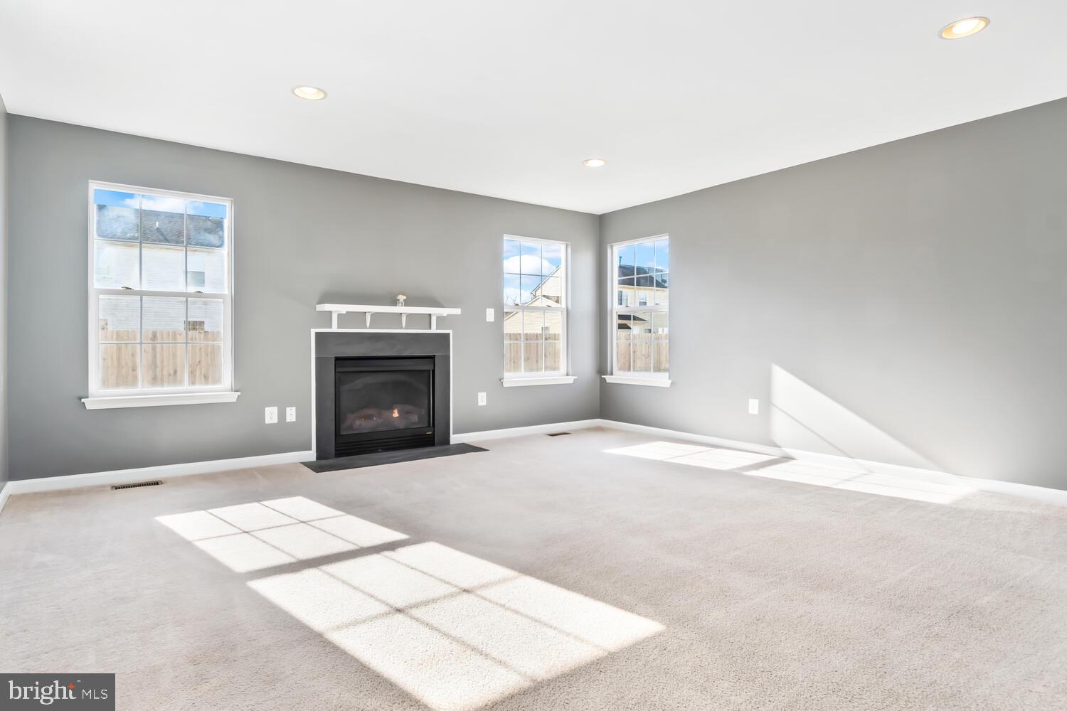 408 Robbins Farm Road Cambridge, MD 21613 - Photo 14 of 48 Bright Family Room w toasty gas Fireplace