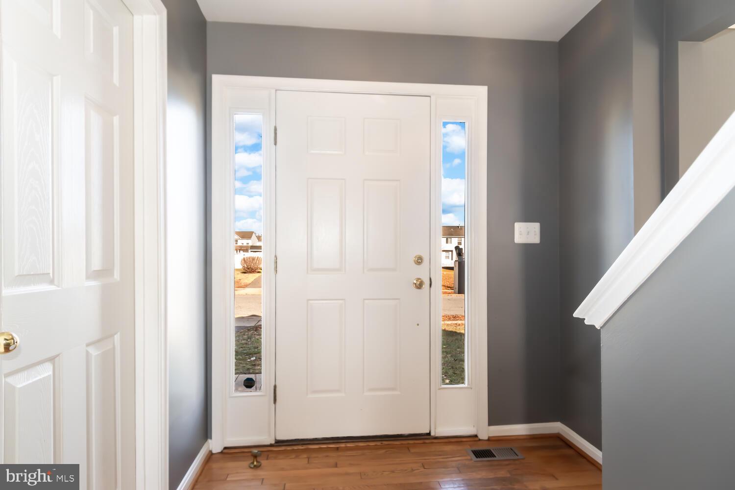 408 Robbins Farm Road Cambridge, MD 21613 - Photo 2 of 48 Foyer with wood floor