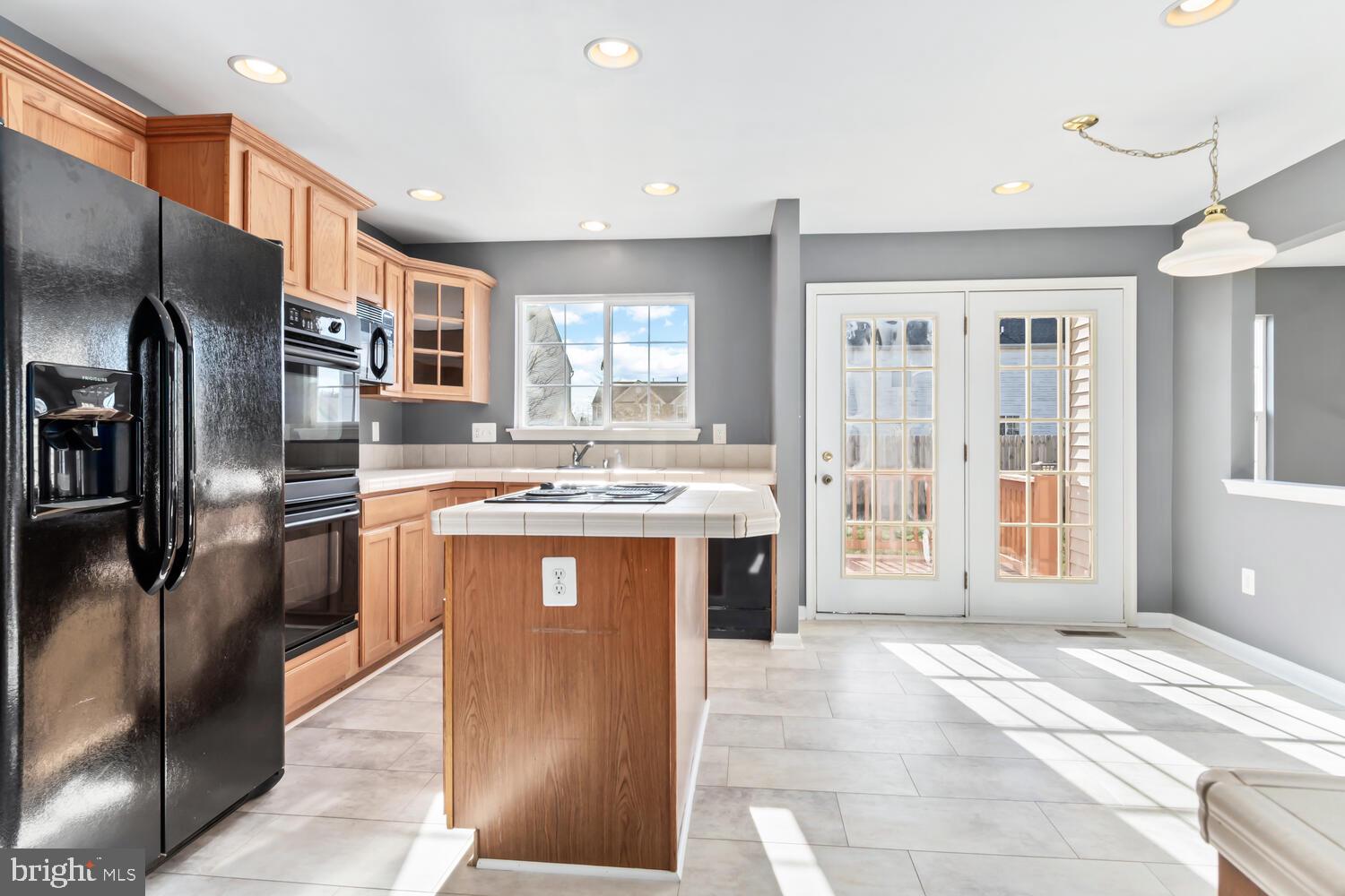 408 Robbins Farm Road Cambridge, MD 21613 - Photo 8 of 48 Kitchen w french doors leading to large deck