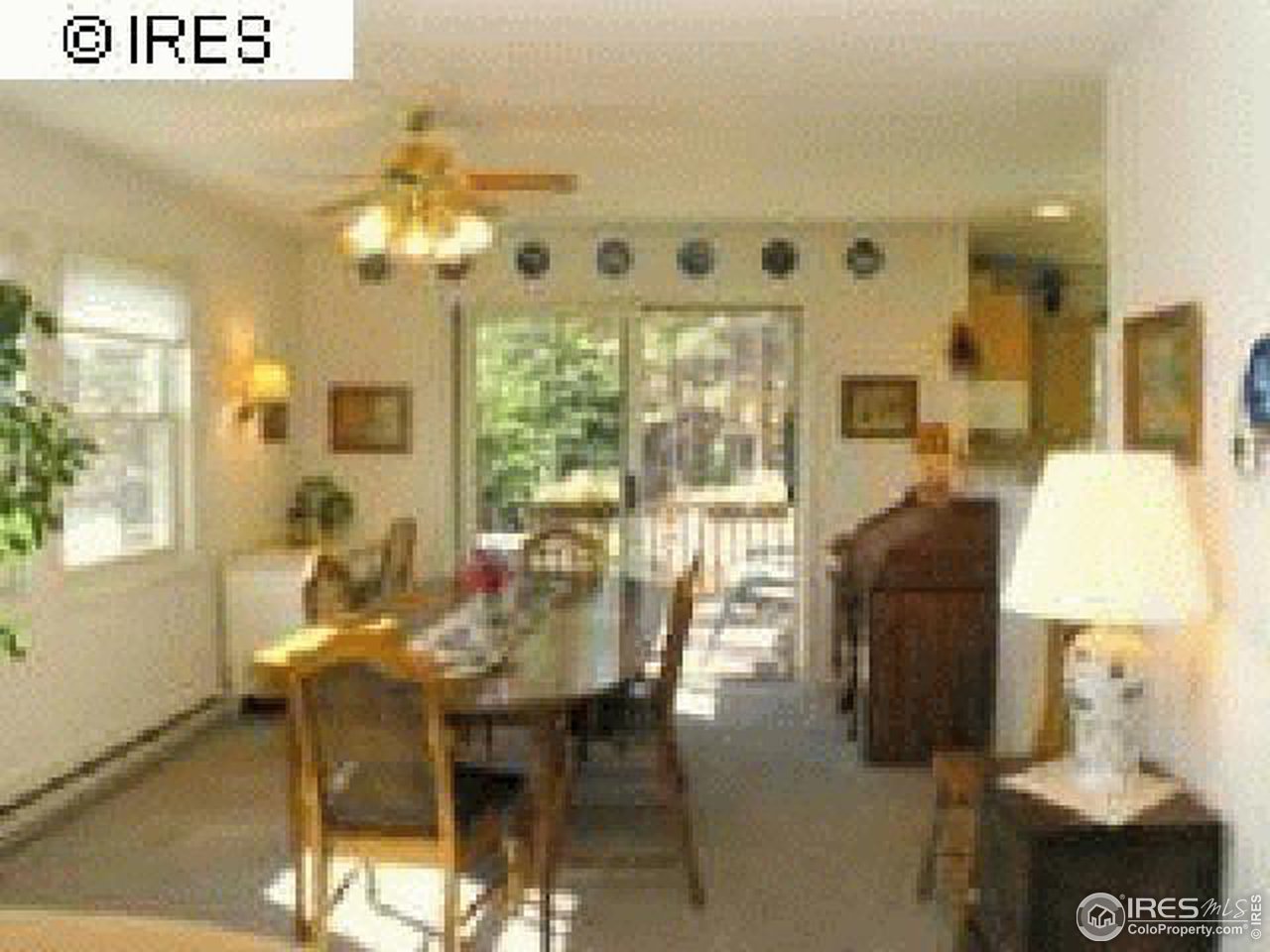 3636 Davis Ranch Road Bellvue, CO 80512 - Photo 5 of 11 a view of a dining room with furniture and chandelier