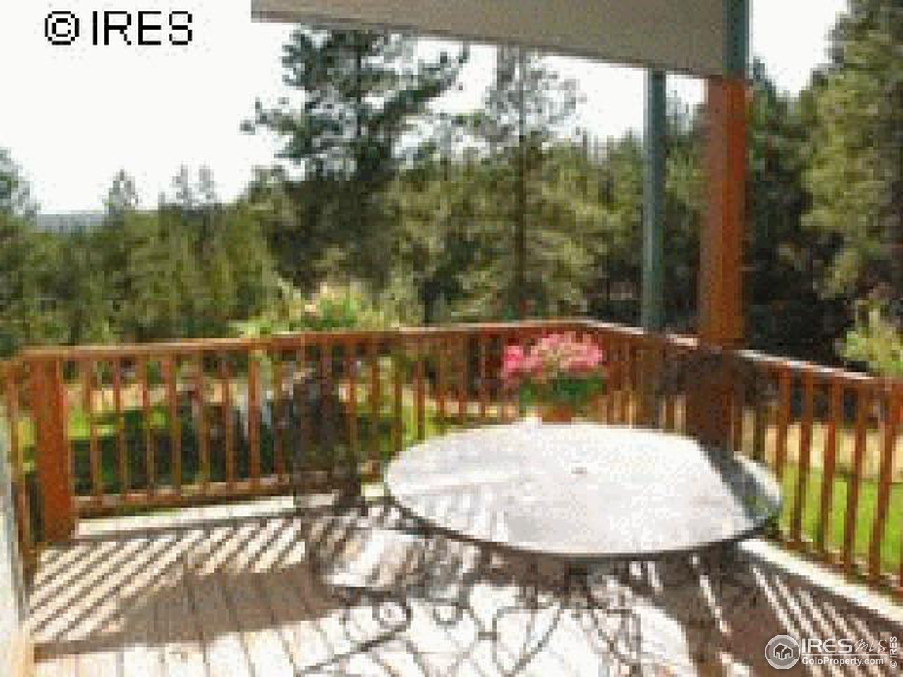 3636 Davis Ranch Road Bellvue, CO 80512 - Photo 10 of 11 a view of a balcony with an outdoor space