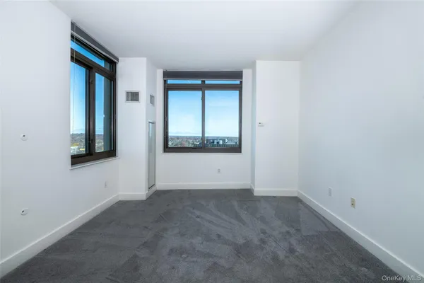 a view of an empty room with window