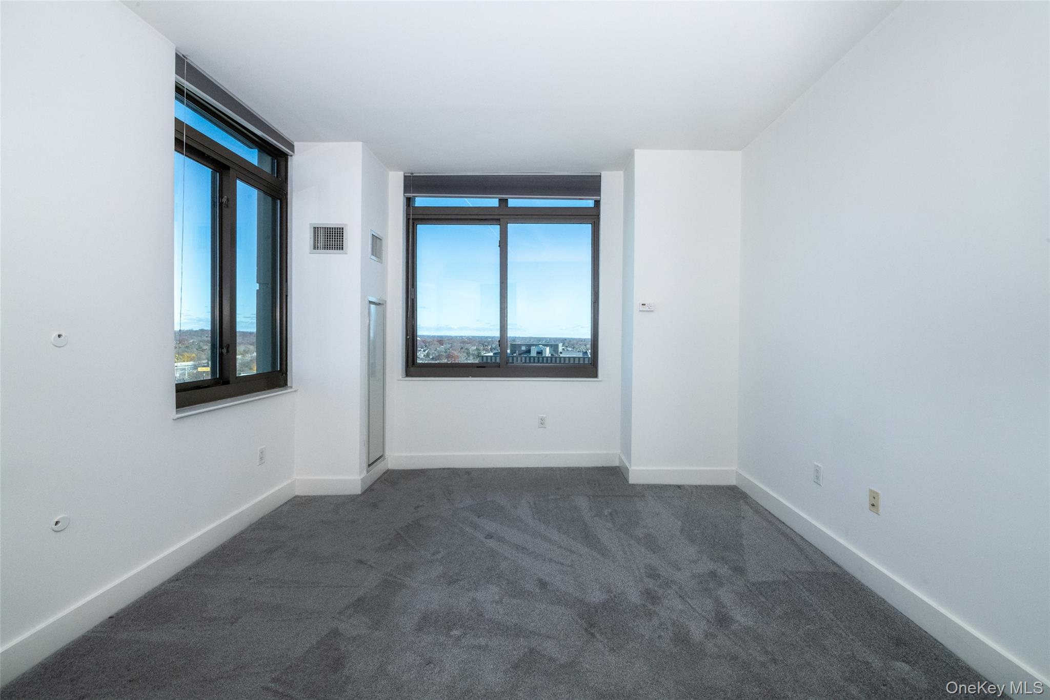 175 Huguenot Street, Unit 1402 New Rochelle, NY 10801 - Photo 14 of 24 with corner windows