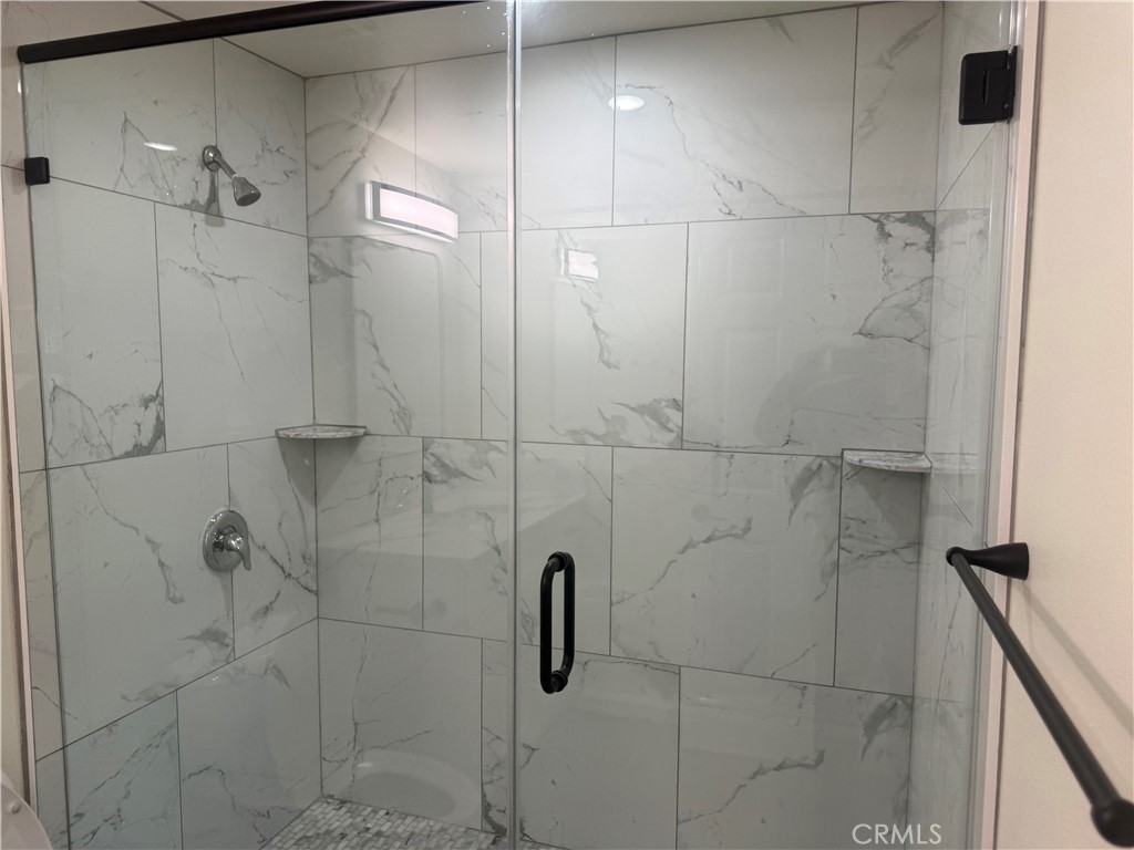 10337 Mull Avenue Riverside, CA 92505 - Photo 20 of 28 a bathroom with a shower