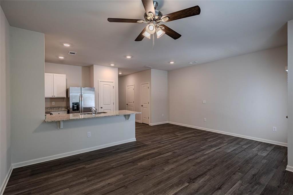 1005 North 2nd Avenue Northwest Rome, GA 30165 - Photo 15 of 20 a view of kitchen with sink microwave and stove