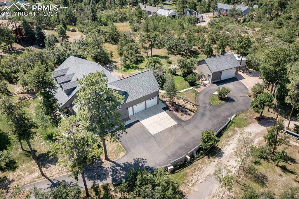 15721 South Furrow Road Larkspur, CO 80118 - Photo 11 of 50 an aerial view of a house with a yard