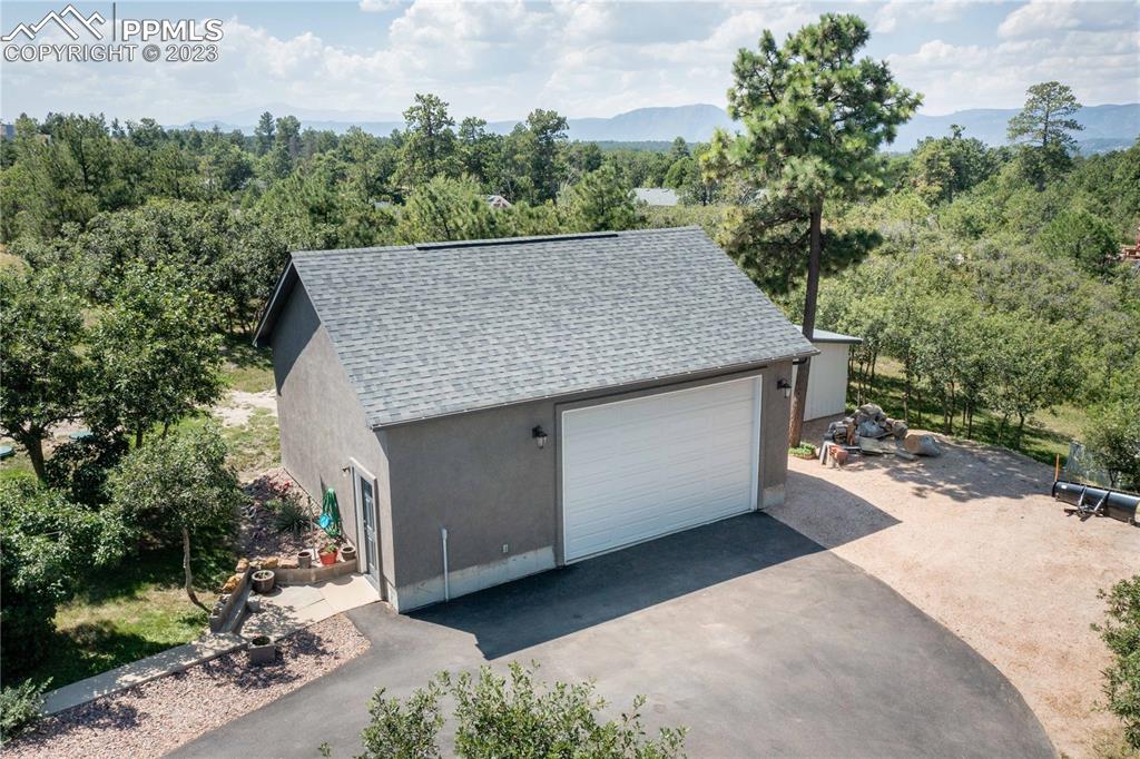15721 South Furrow Road Larkspur, CO 80118 - Photo 13 of 50 an outdoor view with patio