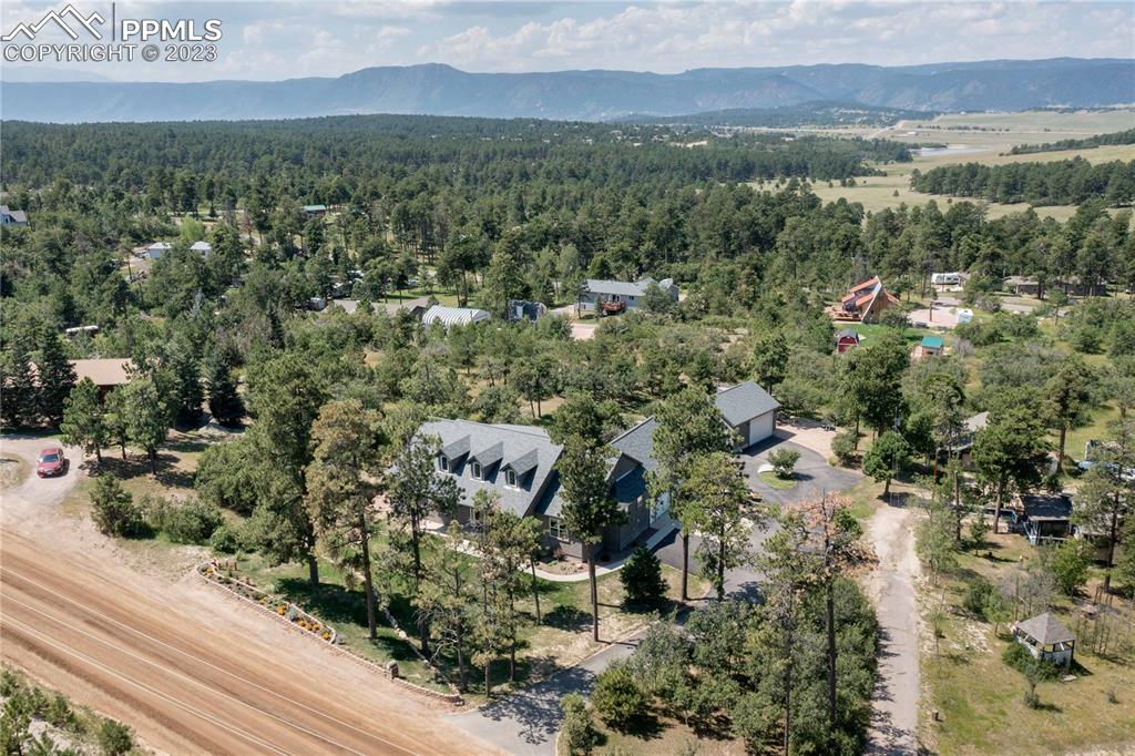 15721 South Furrow Road Larkspur, CO 80118 - Photo 3 of 50 an aerial view of residential house with outdoor space