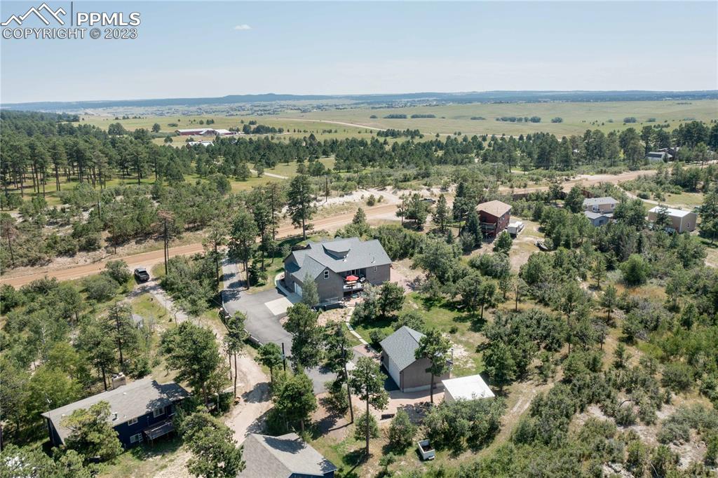 15721 South Furrow Road Larkspur, CO 80118 - Photo 4 of 50 an aerial view of multiple house