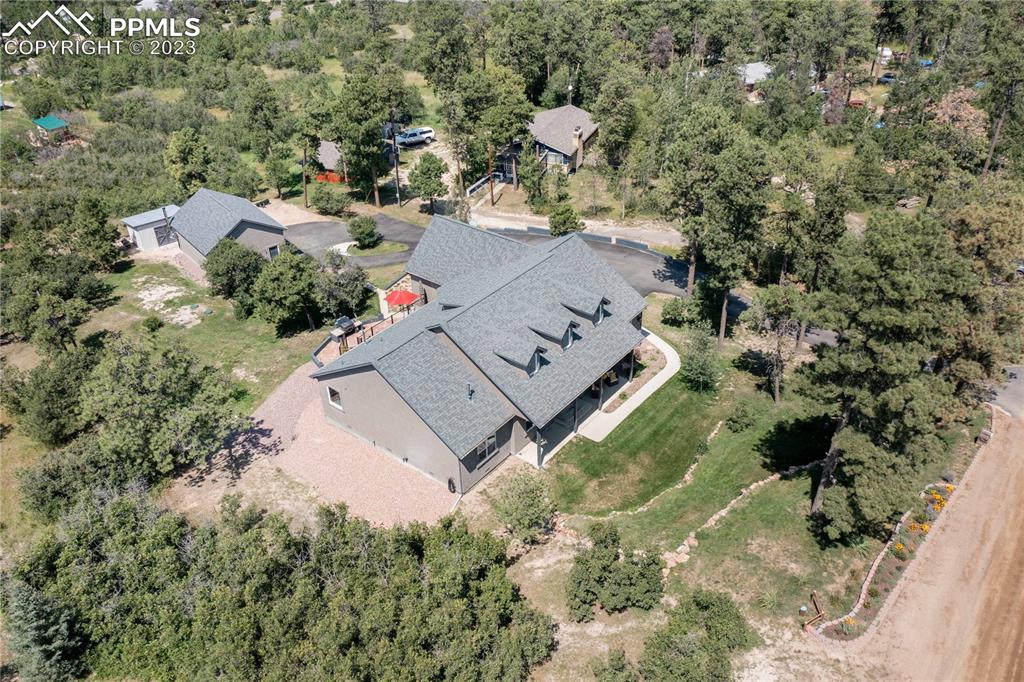 15721 South Furrow Road Larkspur, CO 80118 - Photo 45 of 50 an aerial view of a house with a yard