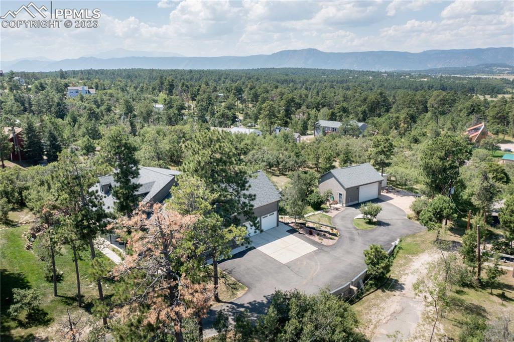15721 South Furrow Road Larkspur, CO 80118 - Photo 48 of 50 an aerial view of a city with lots of residential buildings