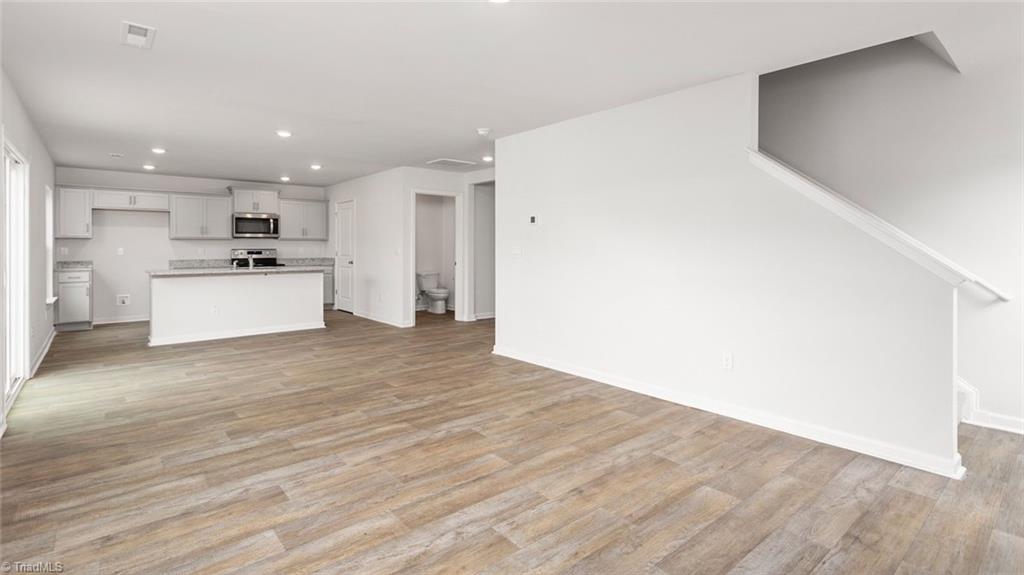 142 West Farm Loop Stokesdale, NC 27357 - Photo 11 of 23 This home model is a representation of it's residential design