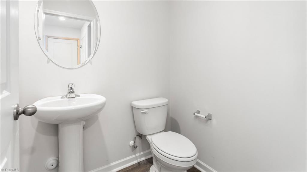 142 West Farm Loop Stokesdale, NC 27357 - Photo 12 of 23 This home model is a representation of it's residential design