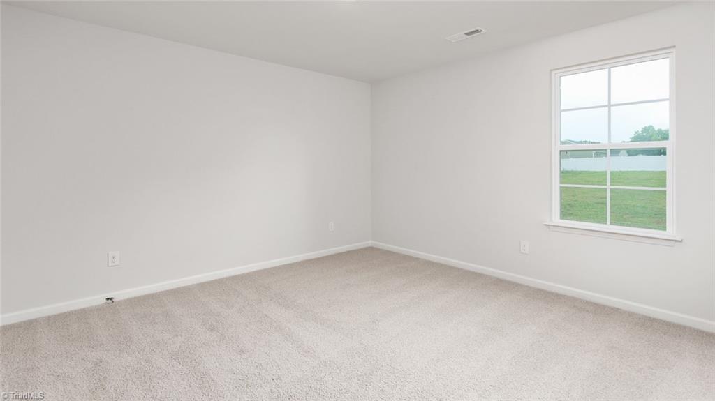 142 West Farm Loop Stokesdale, NC 27357 - Photo 15 of 23 This home model is a representation of it's residential design