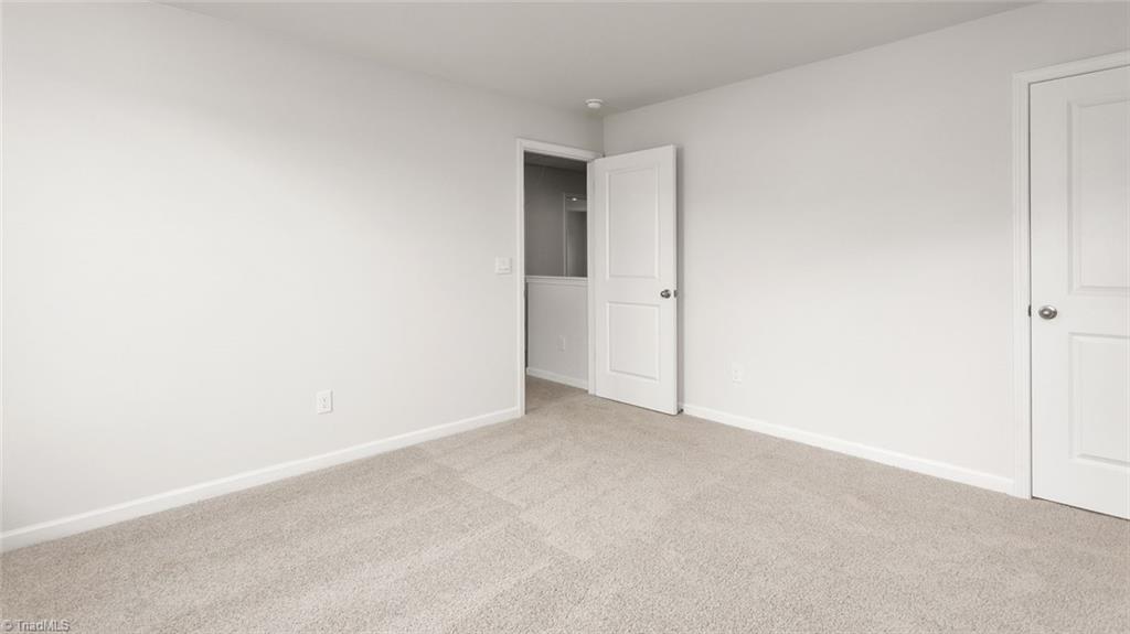 142 West Farm Loop Stokesdale, NC 27357 - Photo 16 of 23 This home model is a representation of it's residential design