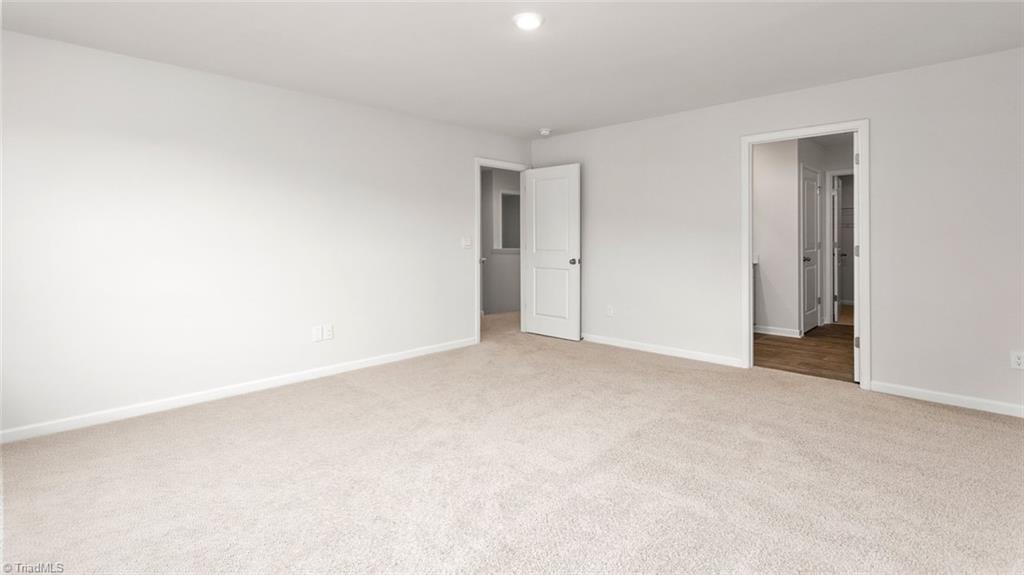 142 West Farm Loop Stokesdale, NC 27357 - Photo 18 of 23 This home model is a representation of it's residential design