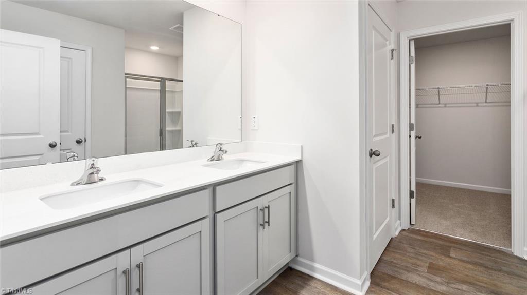 142 West Farm Loop Stokesdale, NC 27357 - Photo 19 of 23 This home model is a representation of it's residential design