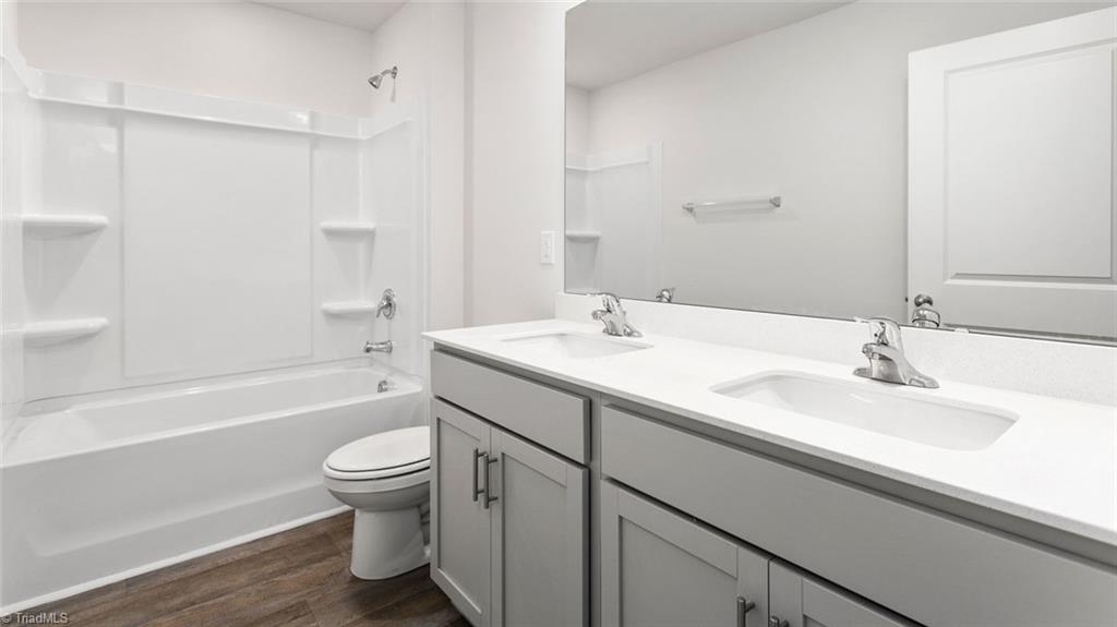 142 West Farm Loop Stokesdale, NC 27357 - Photo 22 of 23 This home model is a representation of it's residential design