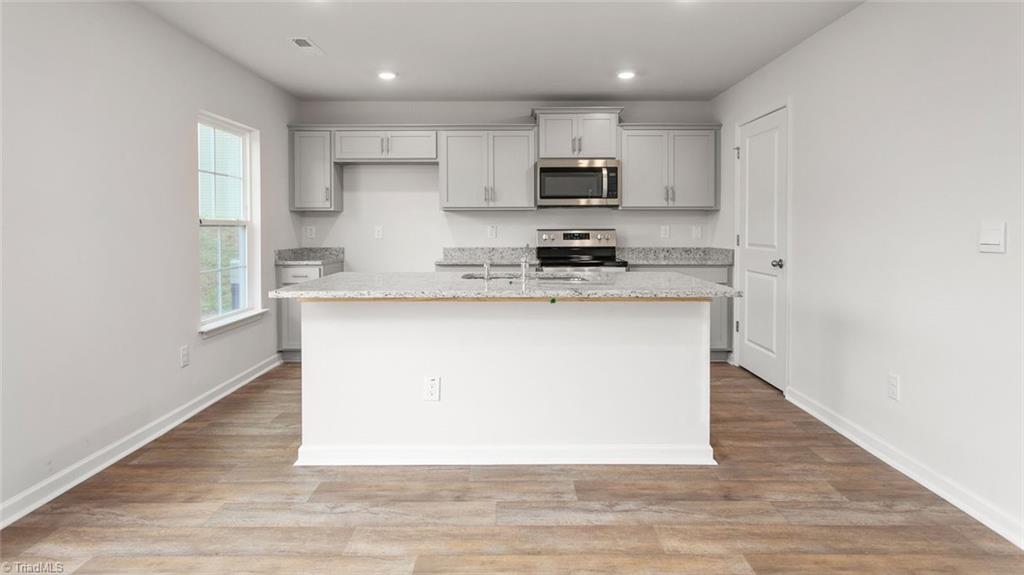 142 West Farm Loop Stokesdale, NC 27357 - Photo 6 of 23 This home model is a representation of it's residential design