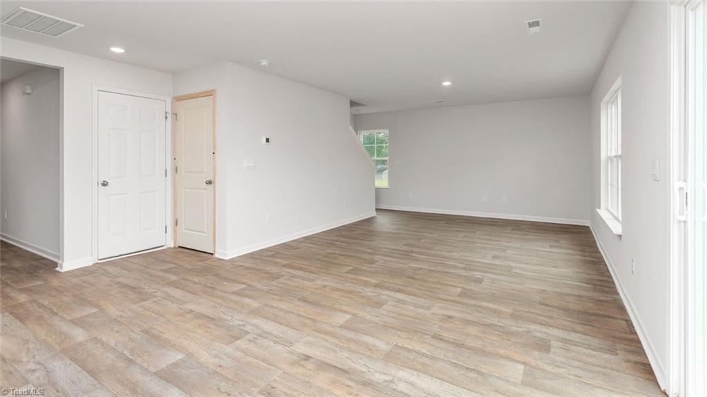 142 West Farm Loop Stokesdale, NC 27357 - Photo 9 of 23 This home model is a representation of it's residential design