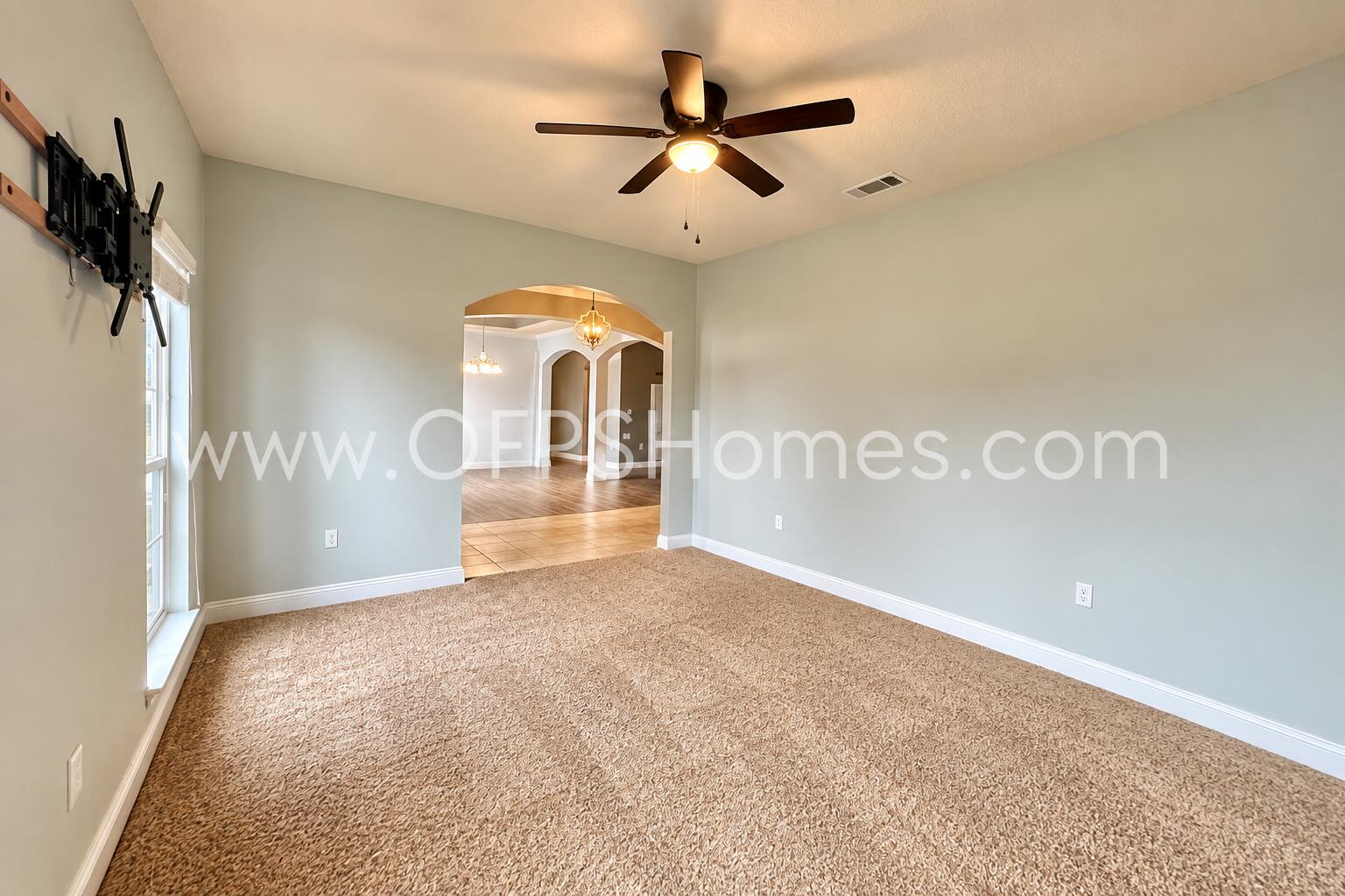 3445 Brownstone Road Crestview, FL 32539 - Photo 6 of 21 Bright Arched Living Room with Ceiling F