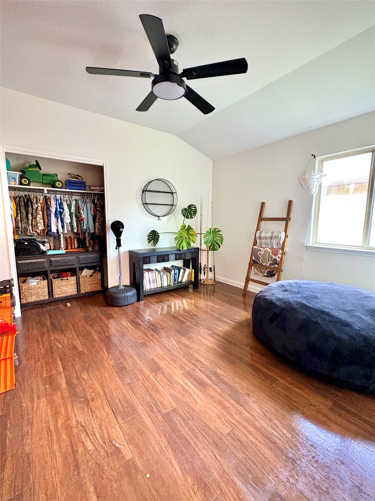 606 Old Peak Road Georgetown, TX 78626 - Photo 12 of 16 a living room with furniture and a wooden floor
