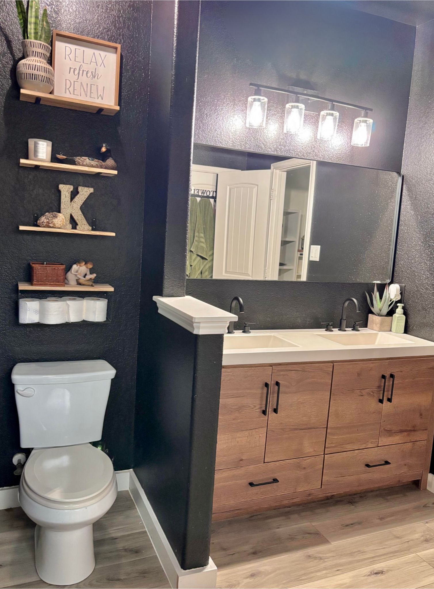 606 Old Peak Road Georgetown, TX 78626 - Photo 14 of 16 a bathroom with a toilet sink and mirror