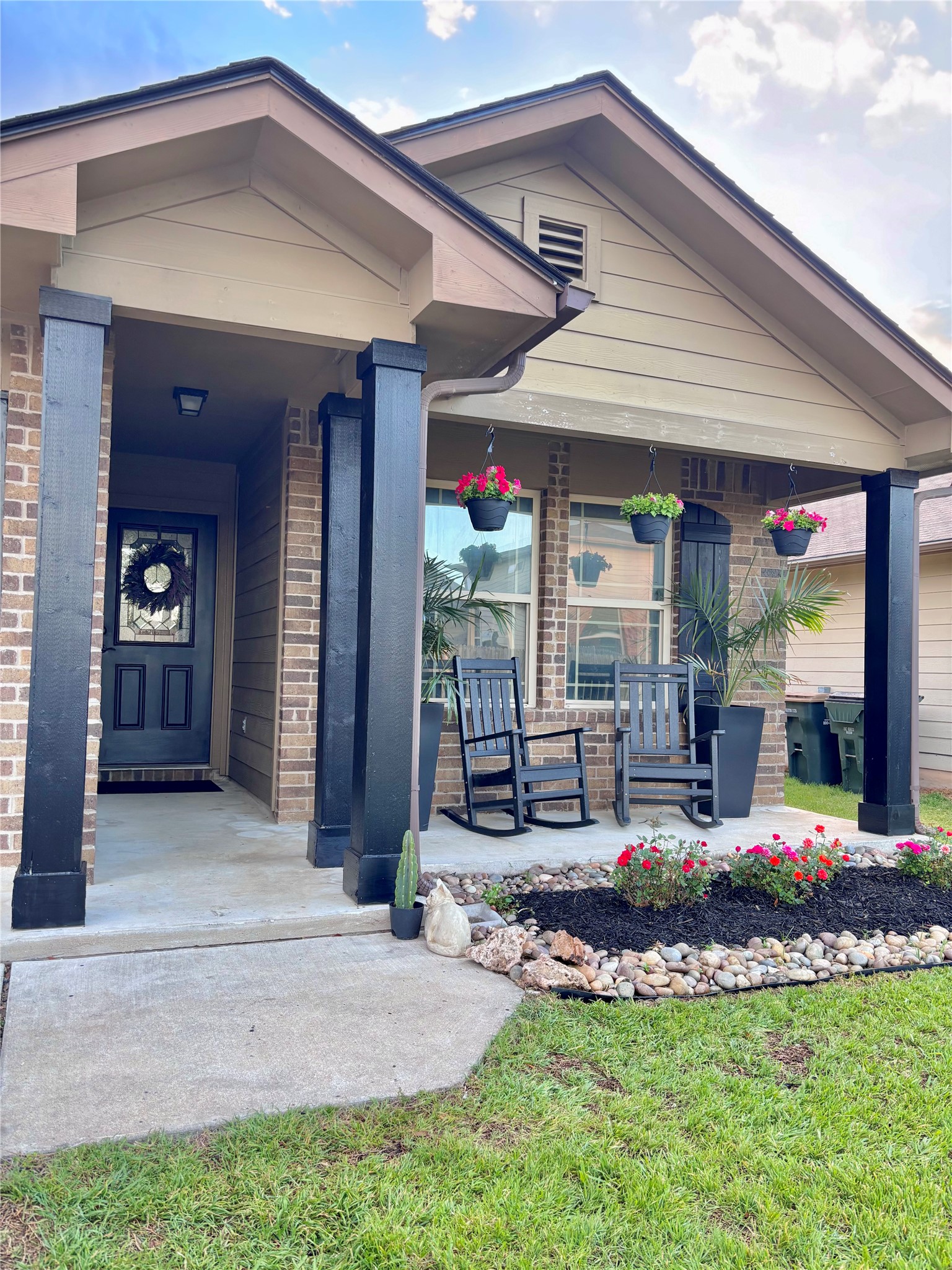 606 Old Peak Road Georgetown, TX 78626 - Photo 2 of 16 a front view of a house with garden