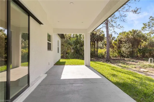 a view of swimming pool with a yard