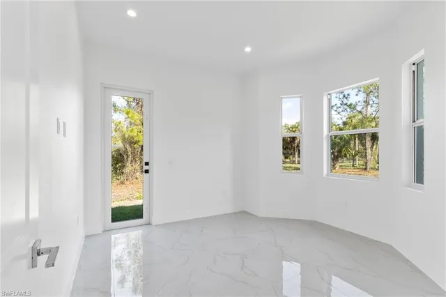 an empty room with windows