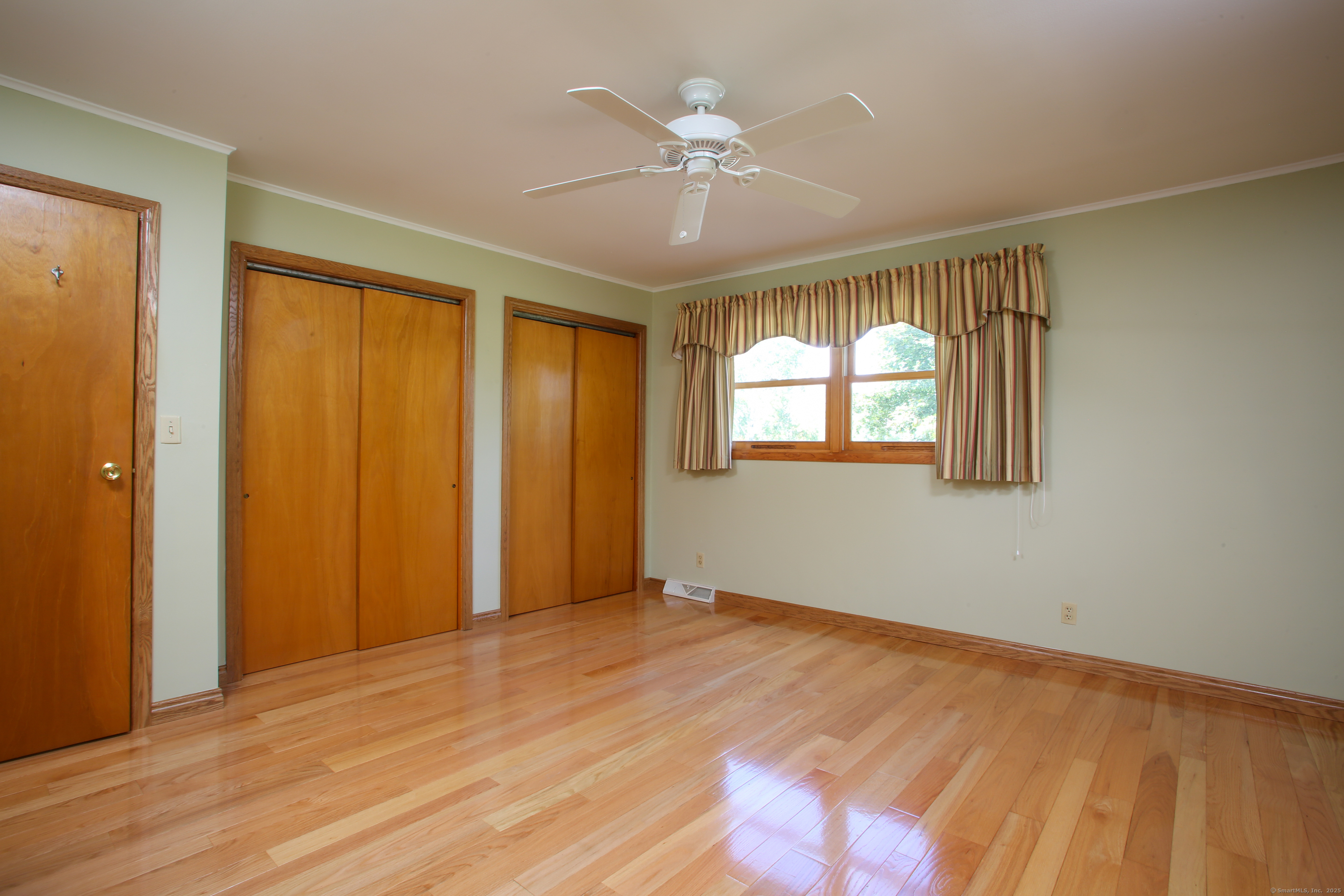 76 Fairchild Road Sharon, CT 06069 - Photo 11 of 39 wooden floor in an empty room with a window