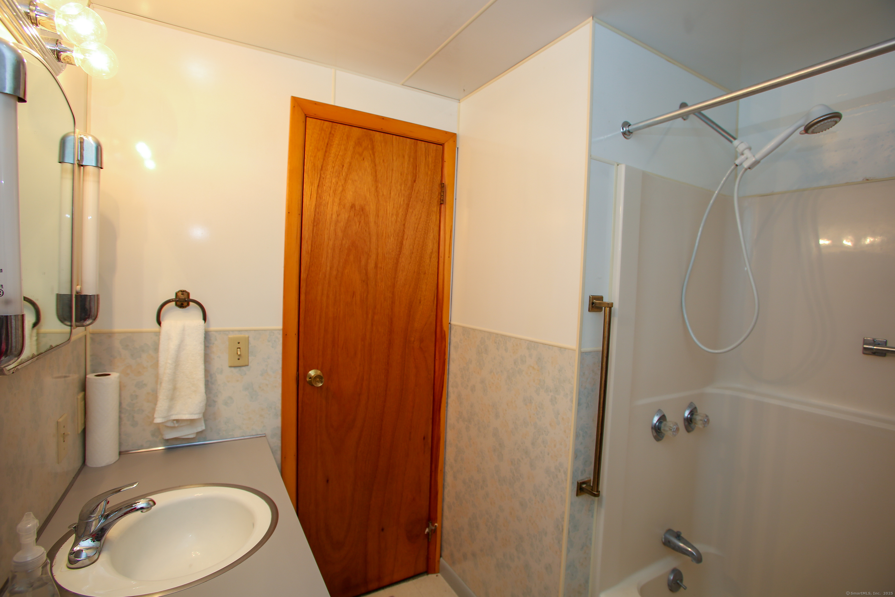 76 Fairchild Road Sharon, CT 06069 - Photo 19 of 39 a bathroom with a sink a toilet and shower