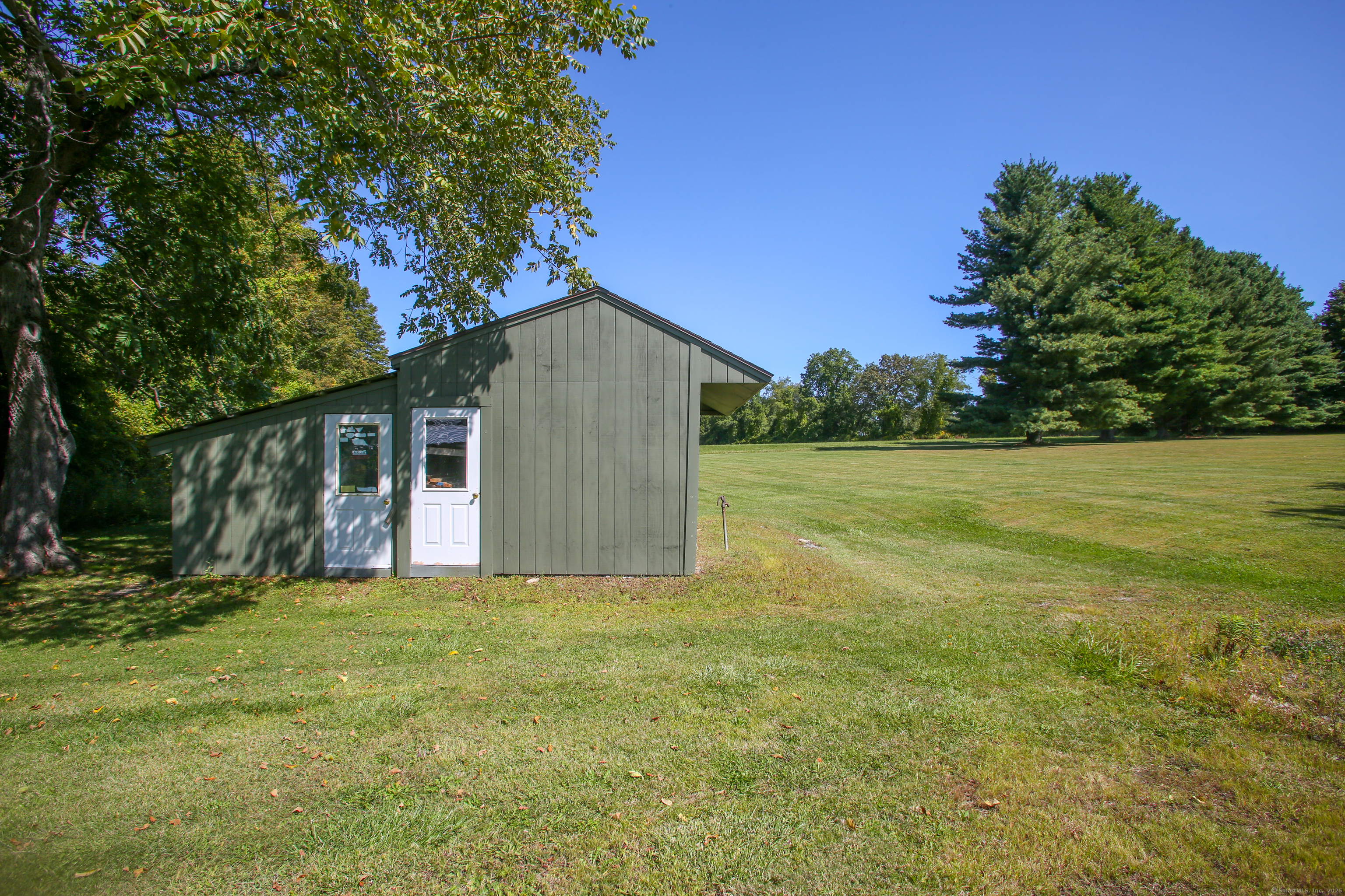 76 Fairchild Road Sharon, CT 06069 - Photo 23 of 39 a view of a house with a yard
