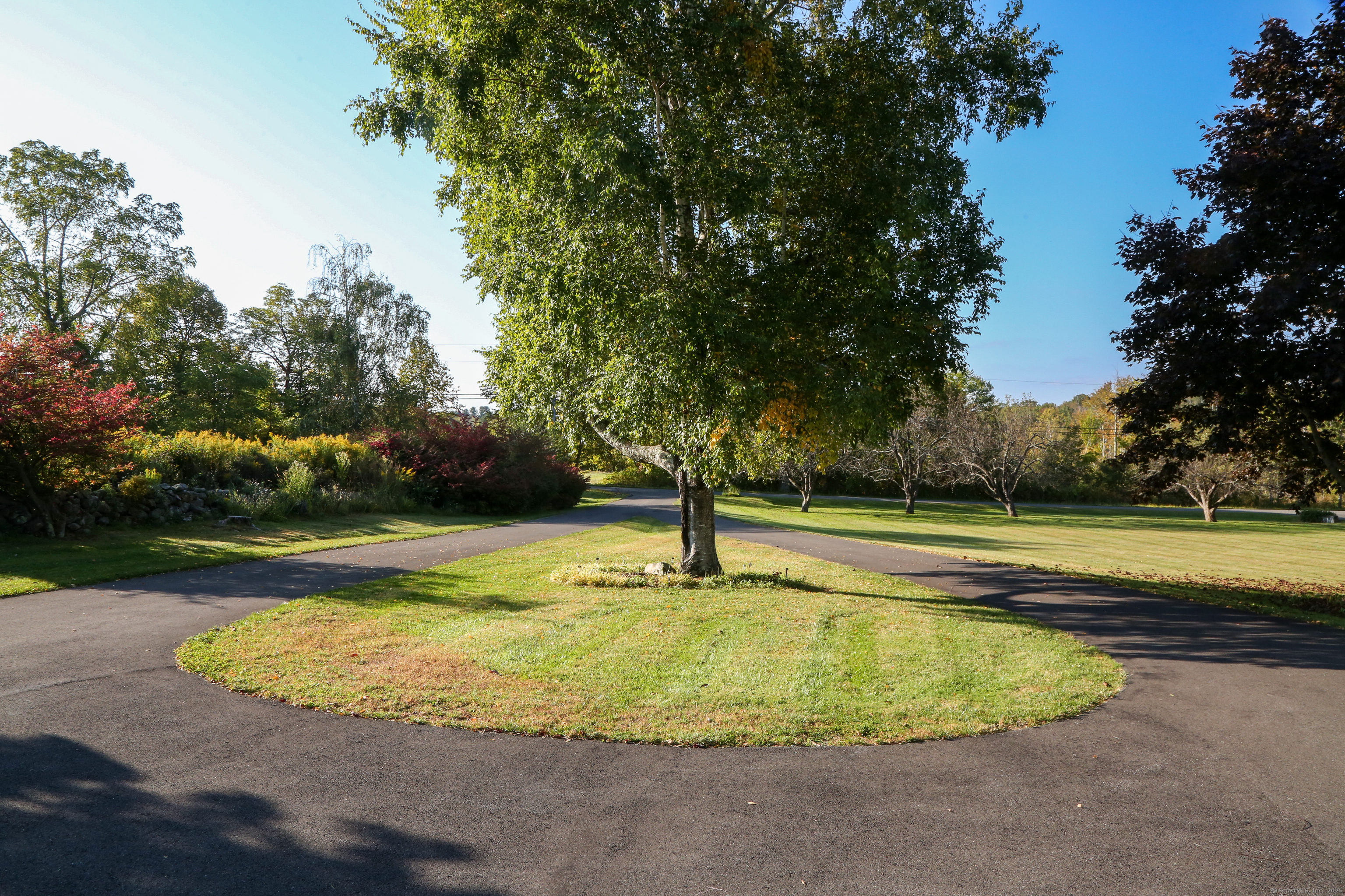 76 Fairchild Road Sharon, CT 06069 - Photo 32 of 39 a view of a swimming pool with a yard