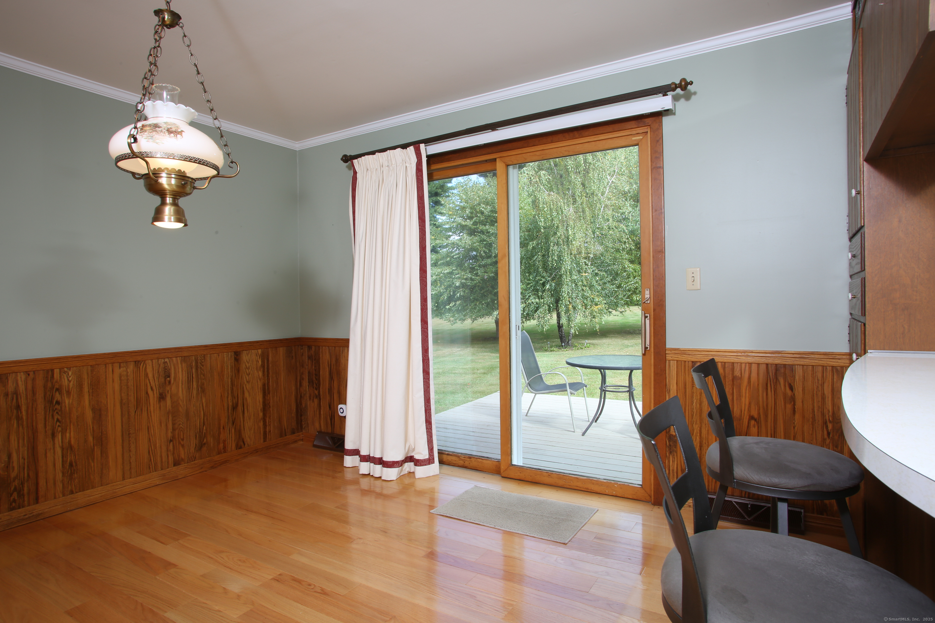 76 Fairchild Road Sharon, CT 06069 - Photo 9 of 39 a view of a room with furniture wooden floor and fan