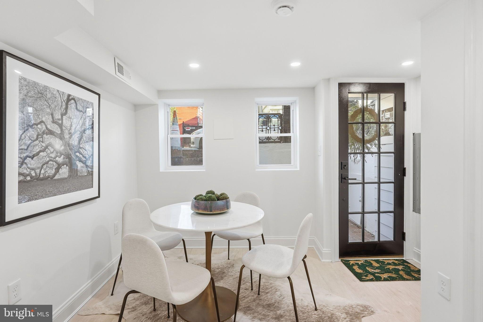 1608 33rd Street Northwest Washington, DC 20007 - Photo 12 of 16 a dining room with furniture and window