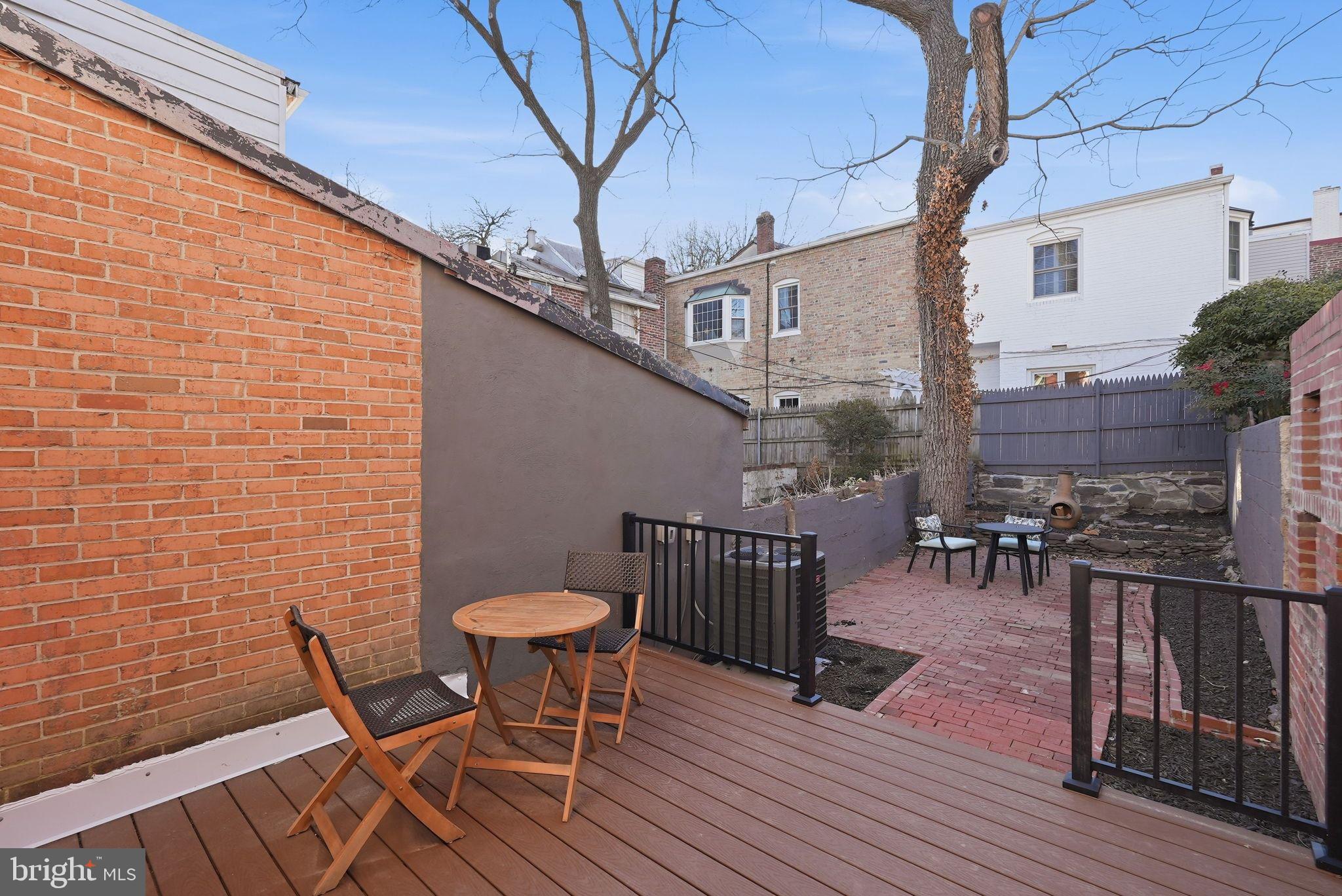 1608 33rd Street Northwest Washington, DC 20007 - Photo 15 of 16 a view of a chairs and a table on the deck