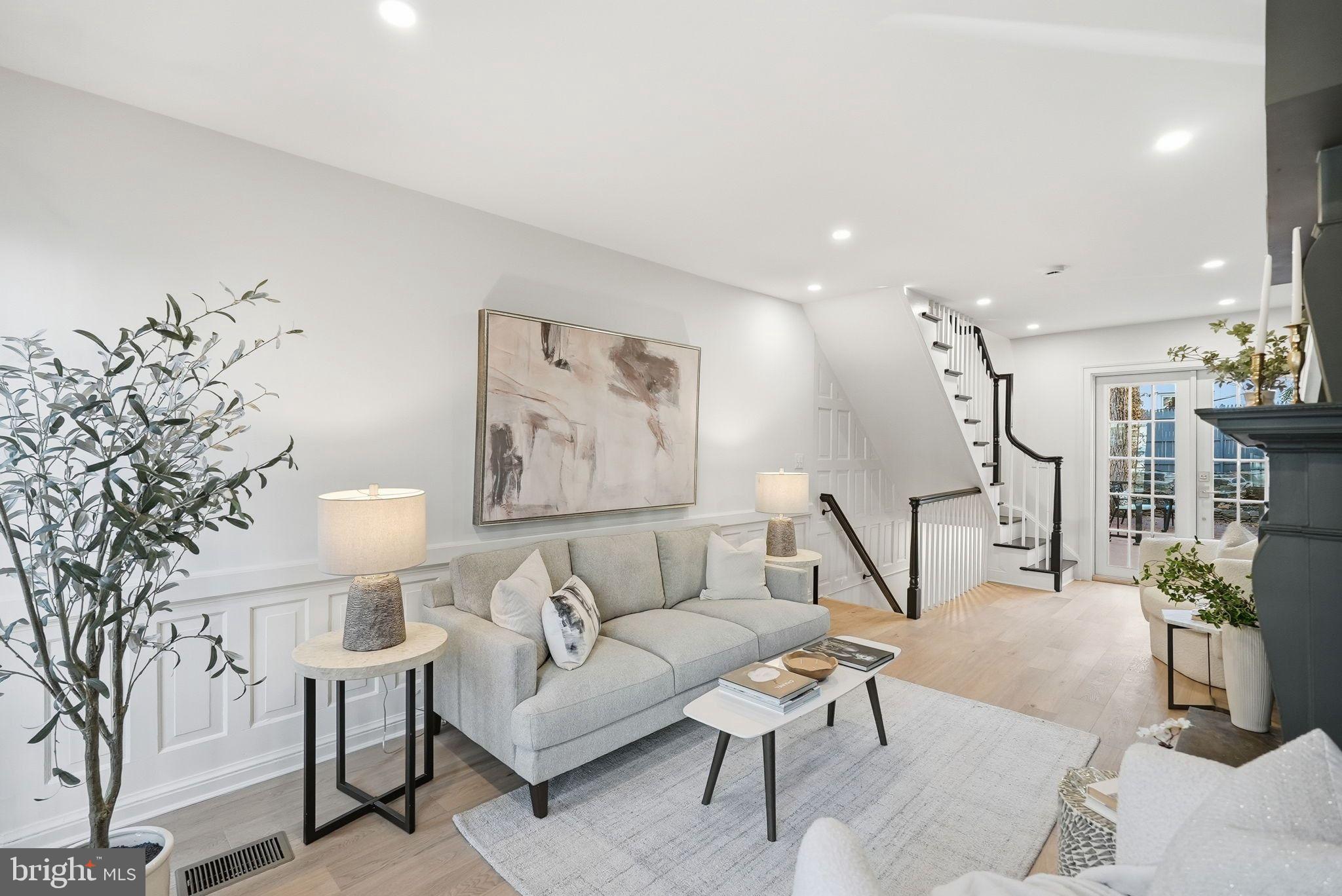 1608 33rd Street Northwest Washington, DC 20007 - Photo 4 of 16 a living room with furniture and a wooden floor